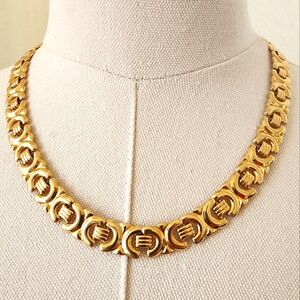 Vintage Avon geometric gold tone necklace.